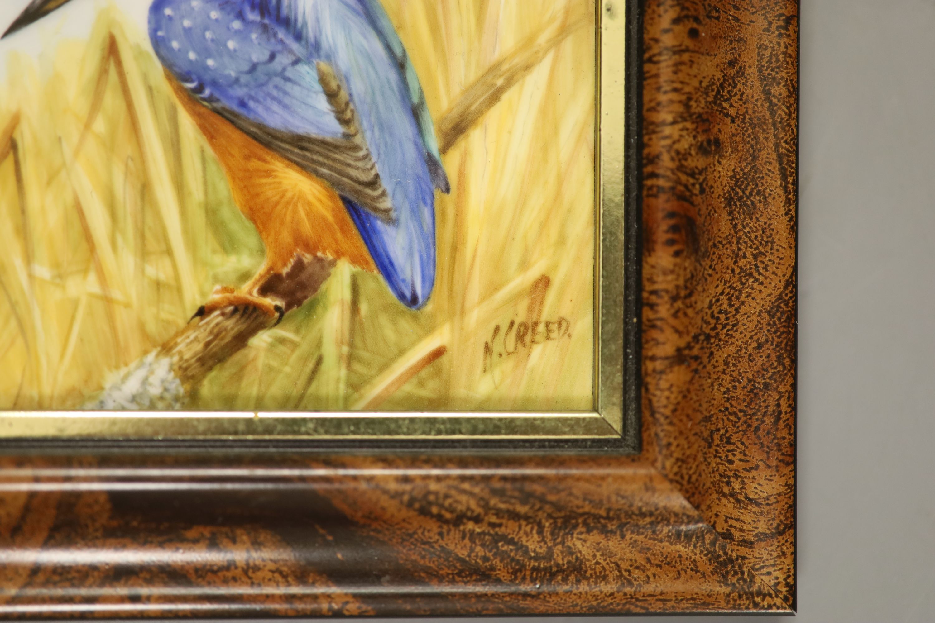 Two plaques, painted with an owl and a kingfisher by ex-Royal Worcester artist N. Creed, signed, 9 x 9.5cm